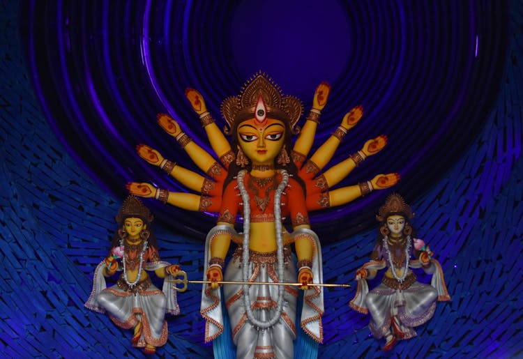 Coloured Figurine Of Multi-armed Goddess Of India