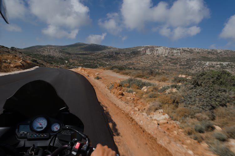 Black Motorcycle In An Asphalt Road 