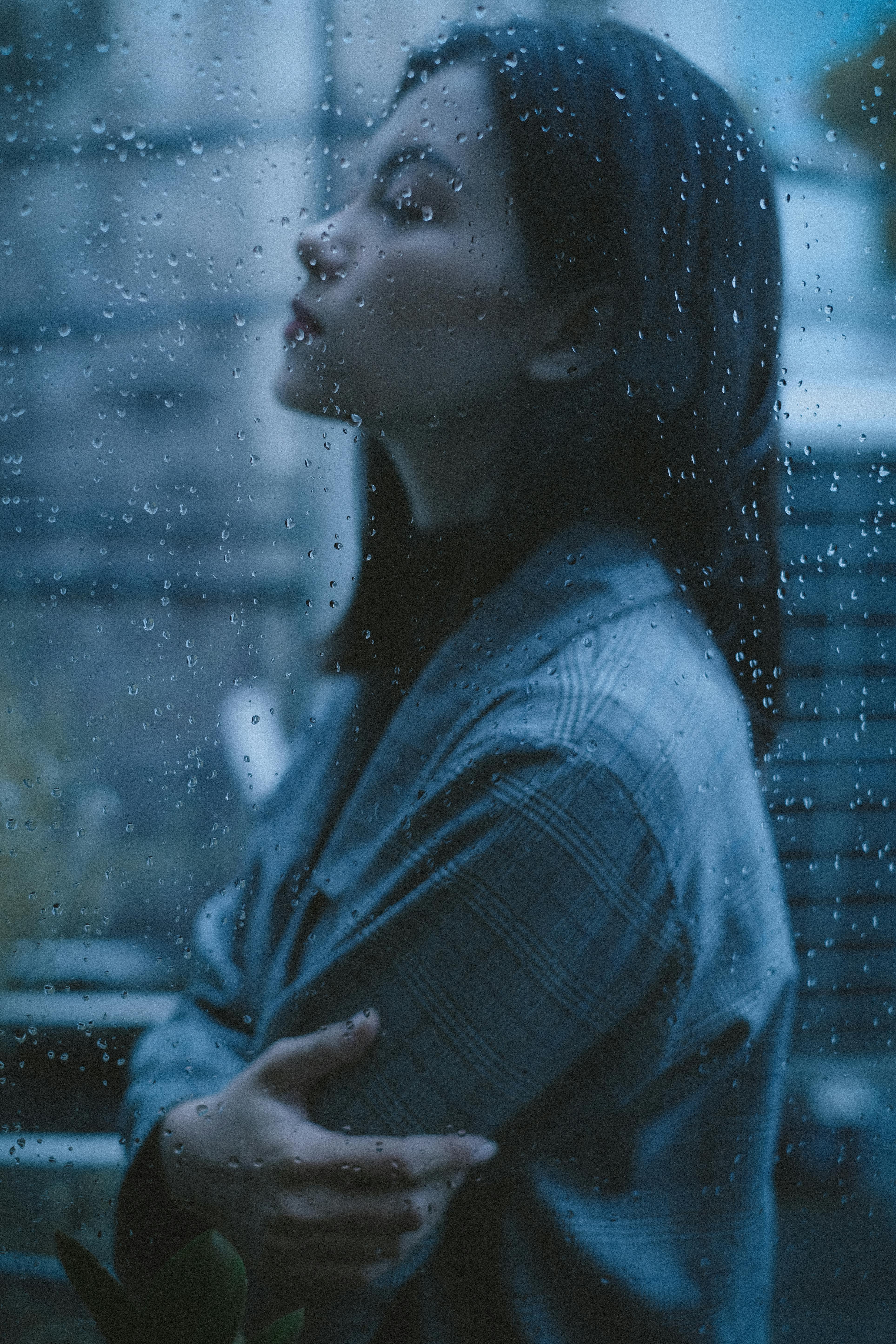 Unhappy thoughtful teen girl arms crossed in rainy day · Free