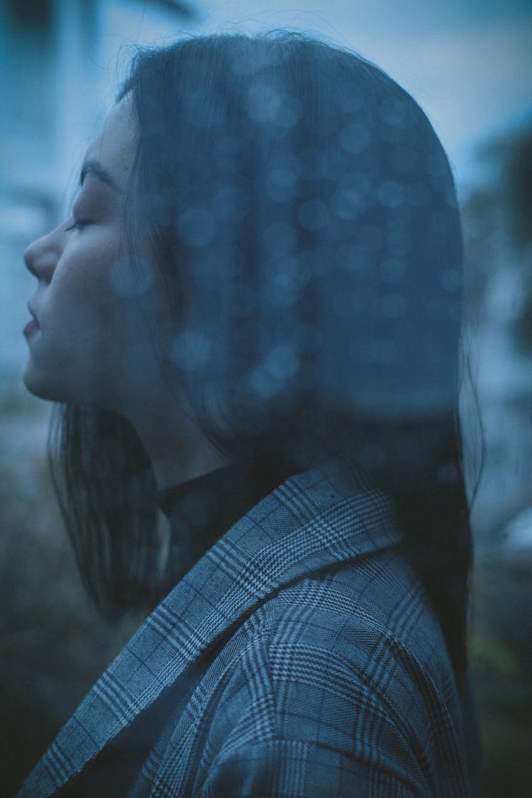 Depressed Teen Girl Thinking With Eyes Closed