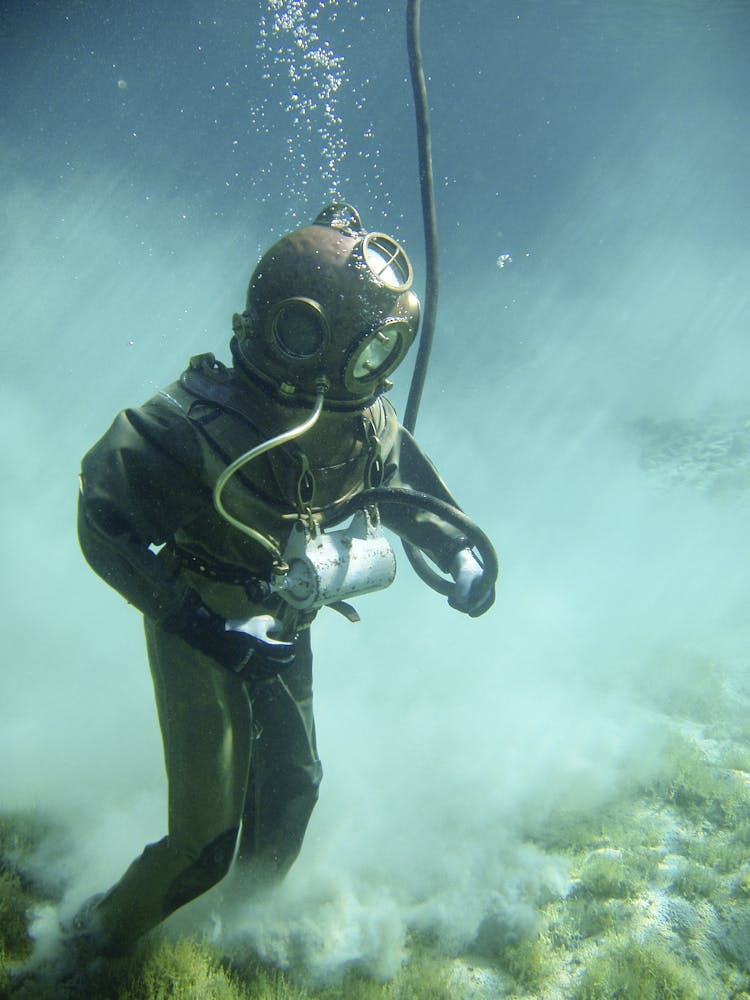 Person In Green Scuba Diving Suit