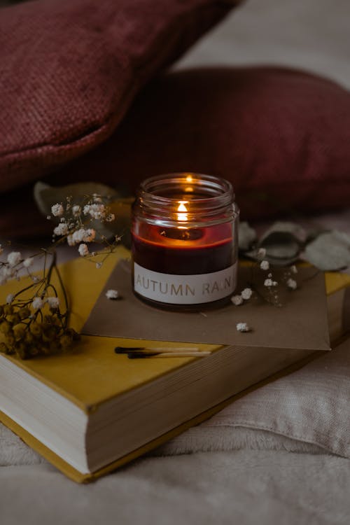 Candle on Top of Book · Free Stock Photo