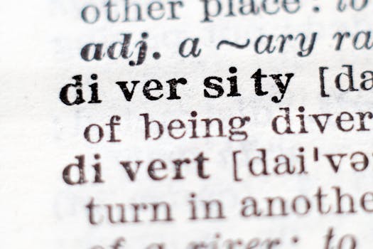 Macro shot of the word 'diversity' in a dictionary with crisp focus on text.