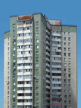 Tall apartment building exterior in Chișinău, Moldova. Modern urban architecture.