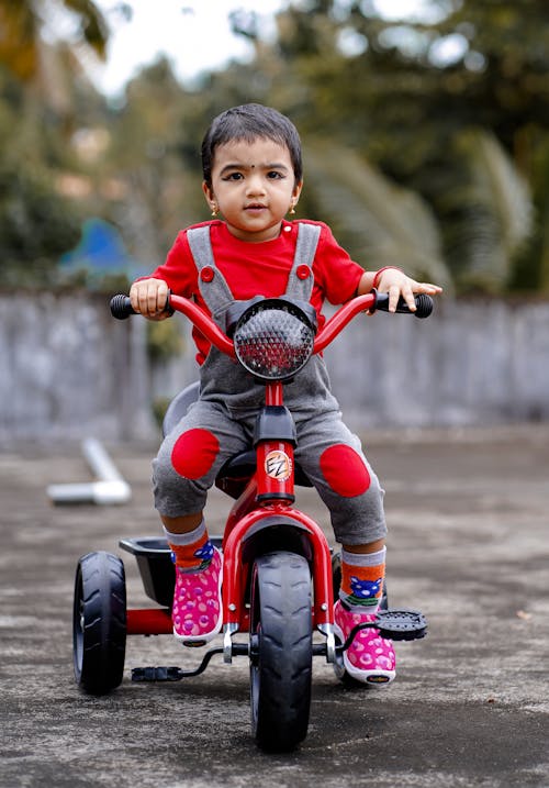 Child riding a Bike Toy 