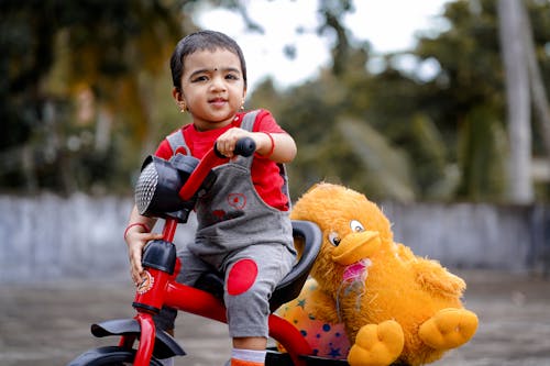 Cute Child riding a Bike Toy 