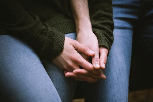 Free Two People holding each other's Hands Stock Photo