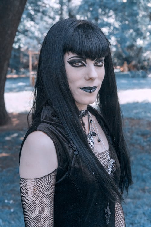 Woman with Black Make-up and Attire