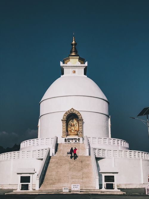 Free Majestic World Peace Pagoda under a clear sky, showcasing Buddhist architecture. Stock Photo