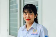 Woman in White Button Up Shirt