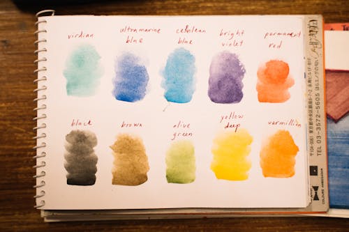 Free Color Palette on a Notepad  Stock Photo