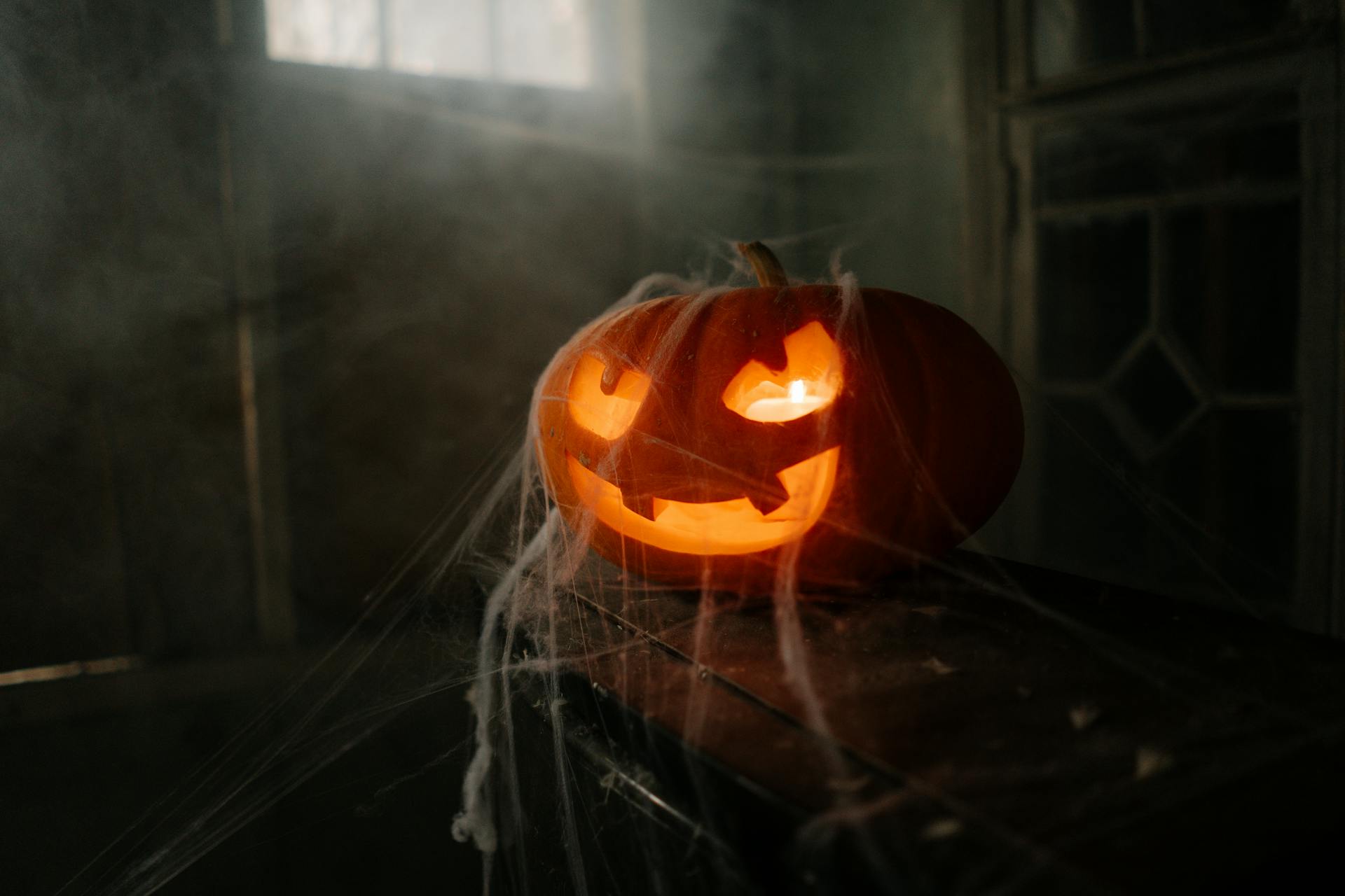 Jack O'Lantern Covered in Spider Web