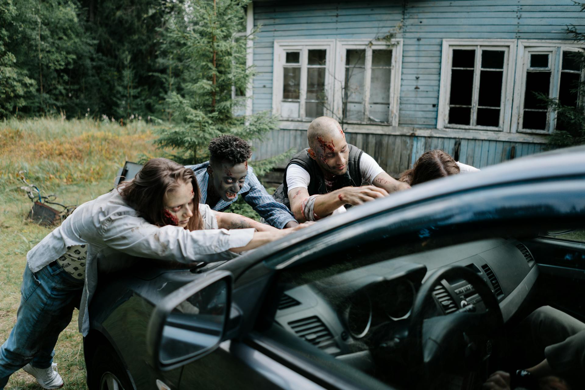 Zombies attacking a Car