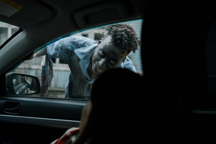 Zombie Peeking Through A Car 