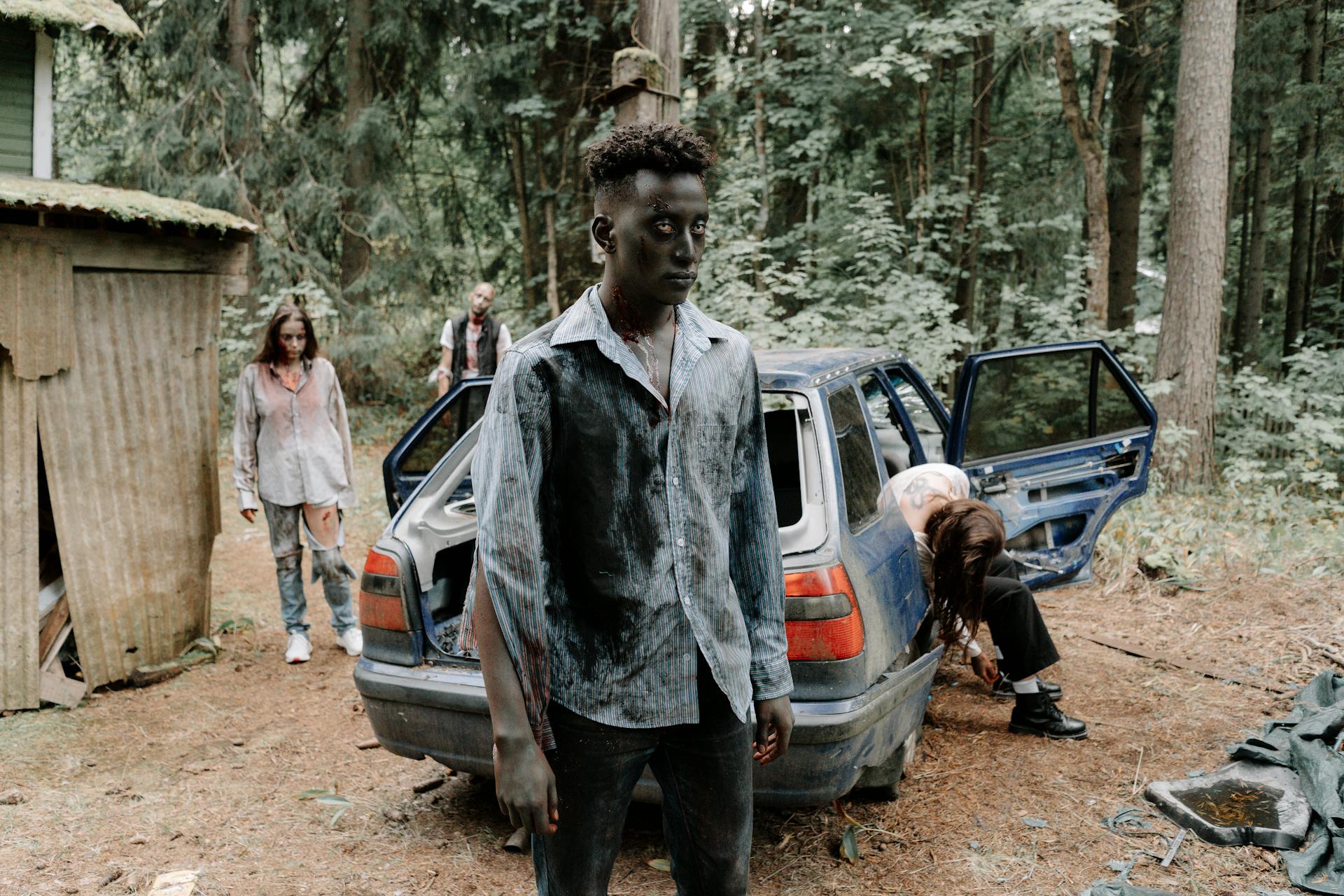 Zombies near Abandoned Car