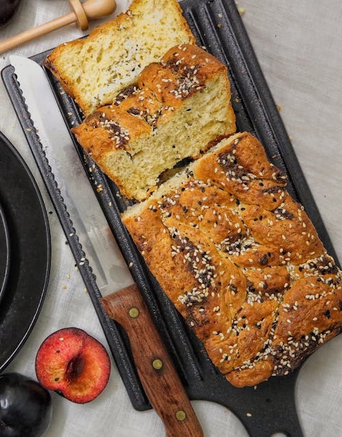 Sliced Brown Bread on Black Tray