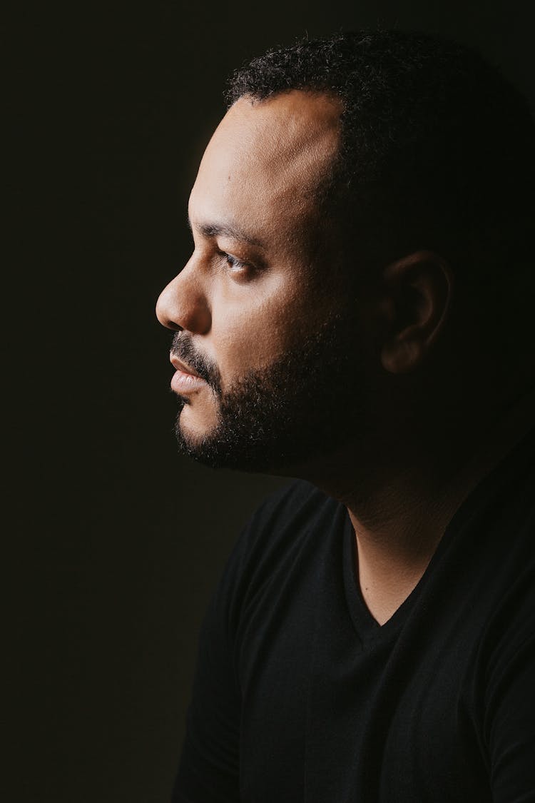 Serious Black Man With Beard Looking Confident