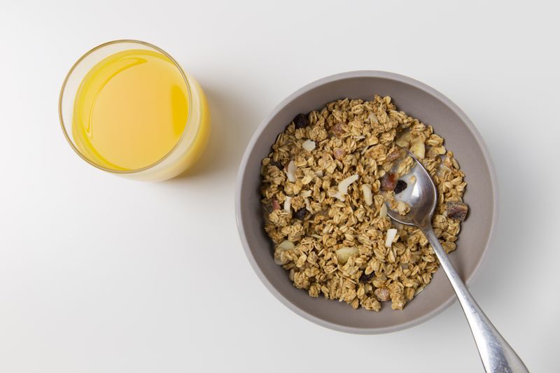 peach cobbler overnight oats with granola topping