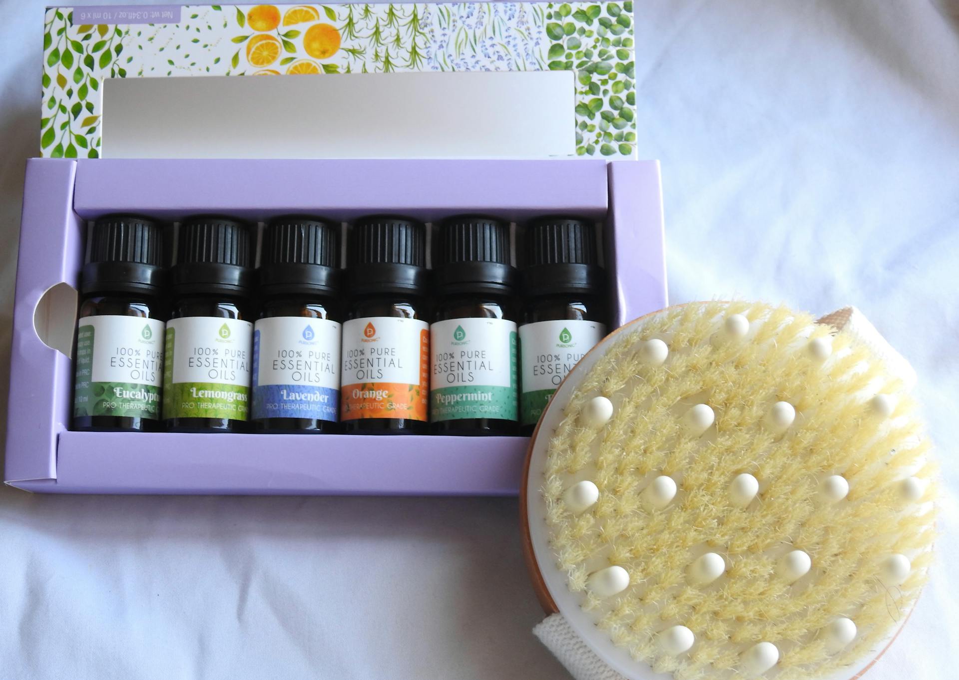 Package of Essential Oils and Dry Massage Brush