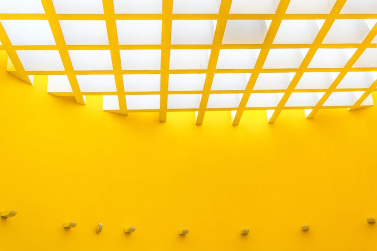 Yellow Wall And Ceiling In Creative Style Building