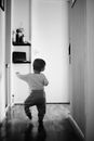 Little Boy Walking Away in the Room