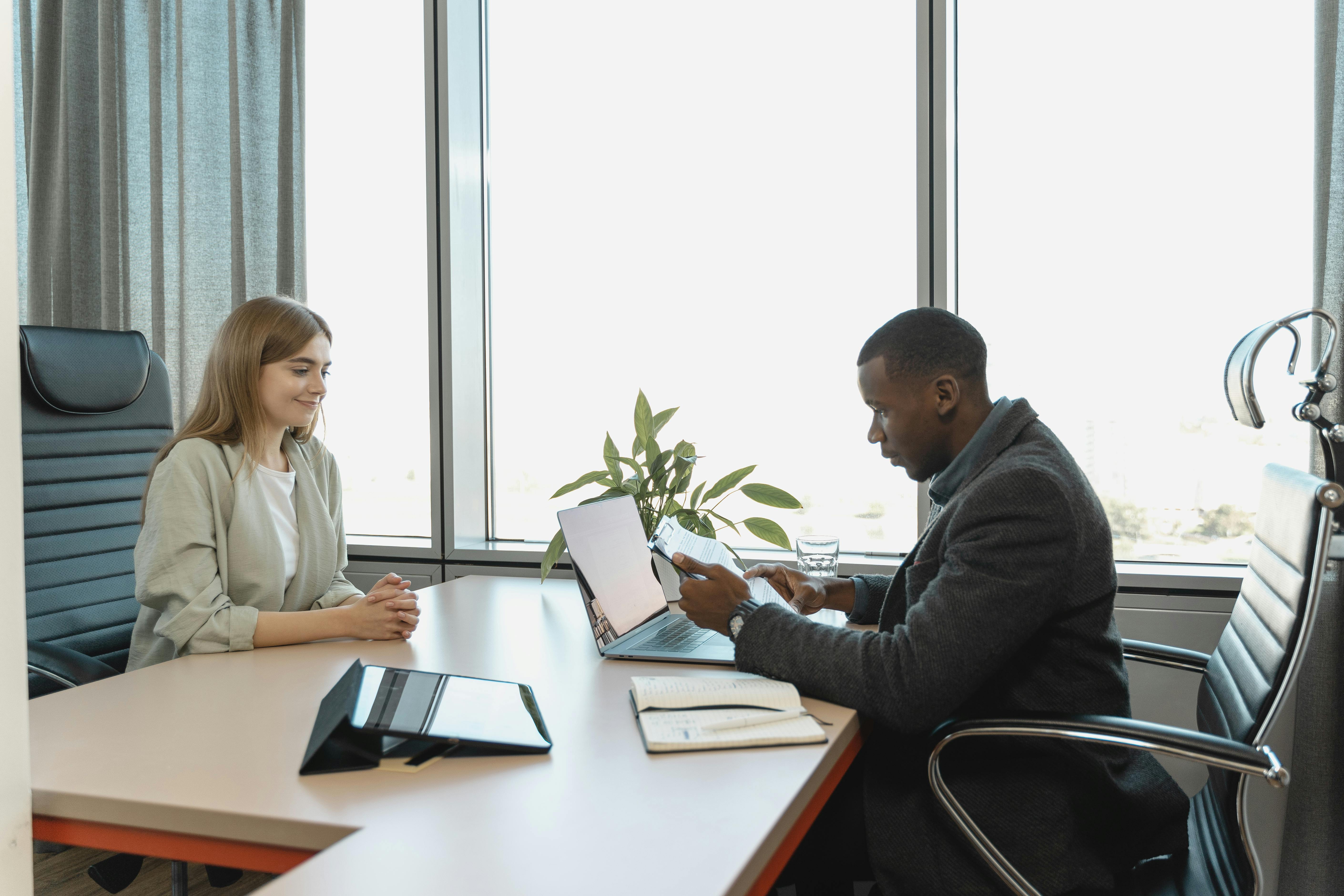 man interviewing the woman