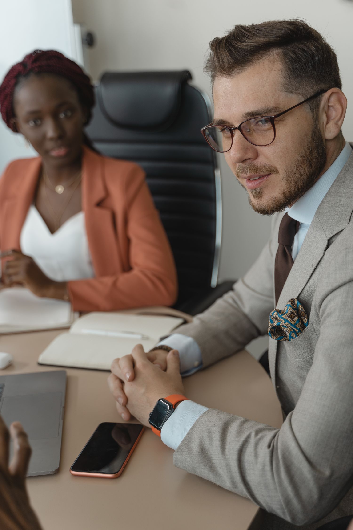 Business professionals analyzing talent data