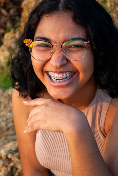 Free A Woman with Eyeglasses Giggling Stock Photo