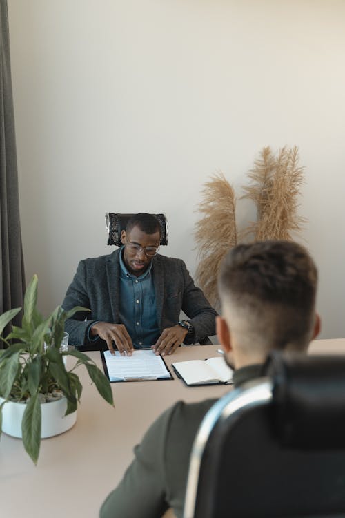 A Man Doing Job Interview to a Candidate 