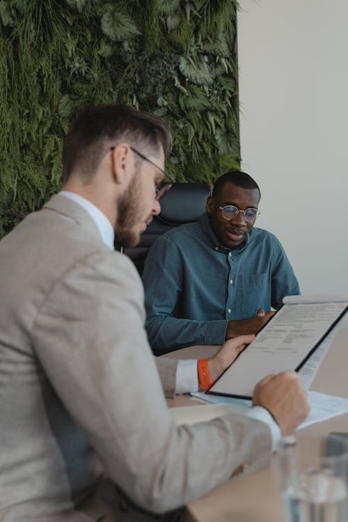 Free Recruiter Looking at a Document Stock Photo