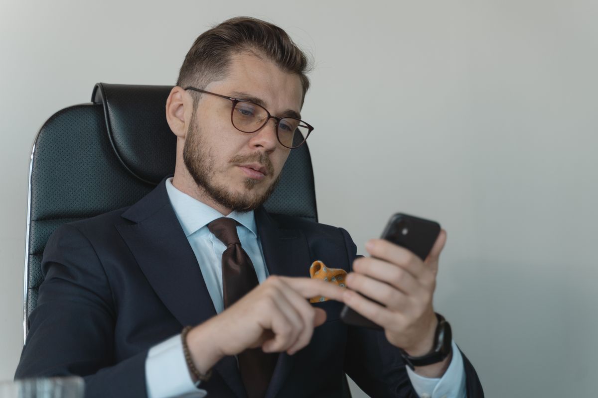 Business professional using a smartphone