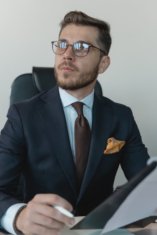 Free Professional in Formal Attire and Black Eyeglasses Stock Photo