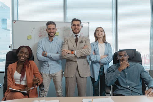 Free Group of Professionals in a Room  Stock Photo