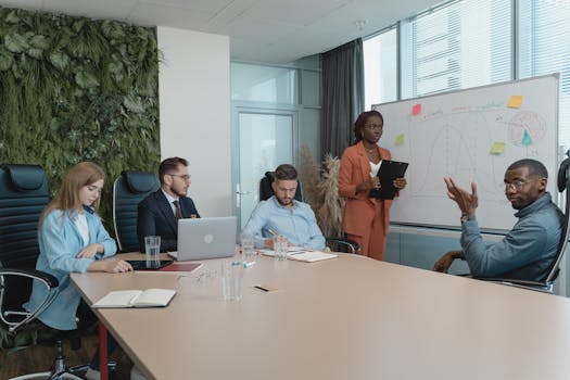 Diverse group of professionals engaged in an innovative brainstorming session in a modern office setting.