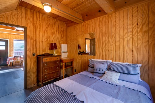 Bedroom of a Wooden House