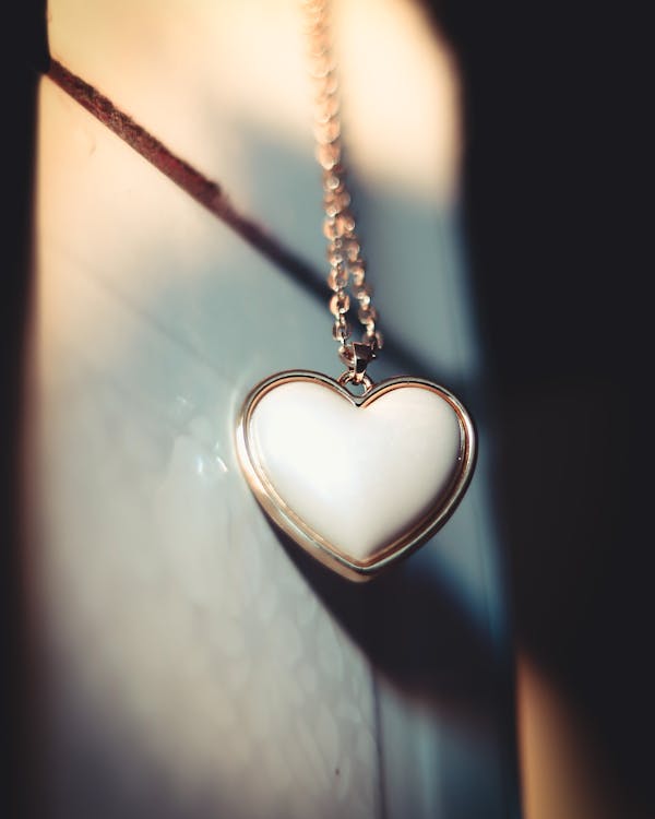 Free Heart Shape Pendant in a Gold Chain Stock Photo