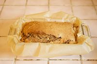 Freshly baked banana loaf in a parchment-lined tin — photo by Rachel Loughman on Pexels