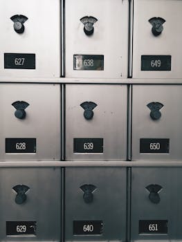 Close-up of vintage metal lockers with combination dials in Gettysburg, PA.