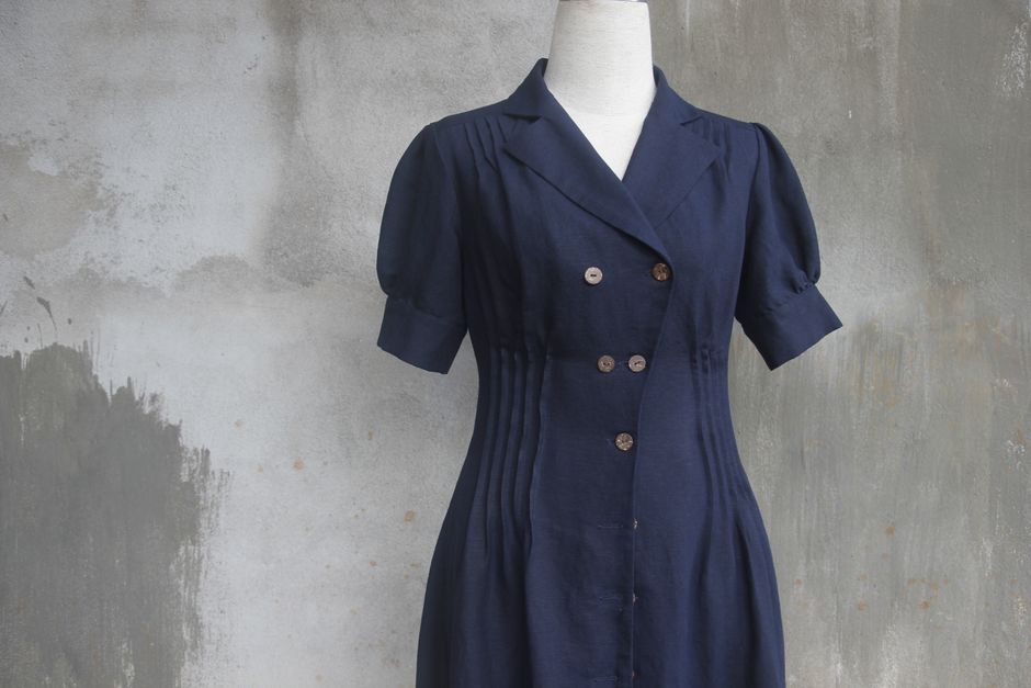 Button Down Midi Dress showcased at the store, affordable fashion