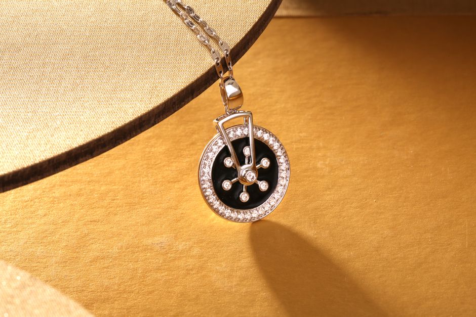 Modern geometric 18k gold pendant with sleek clean lines and diamond accents Modern geometric 18k gold pendant with sleek clean lines and diamond accents