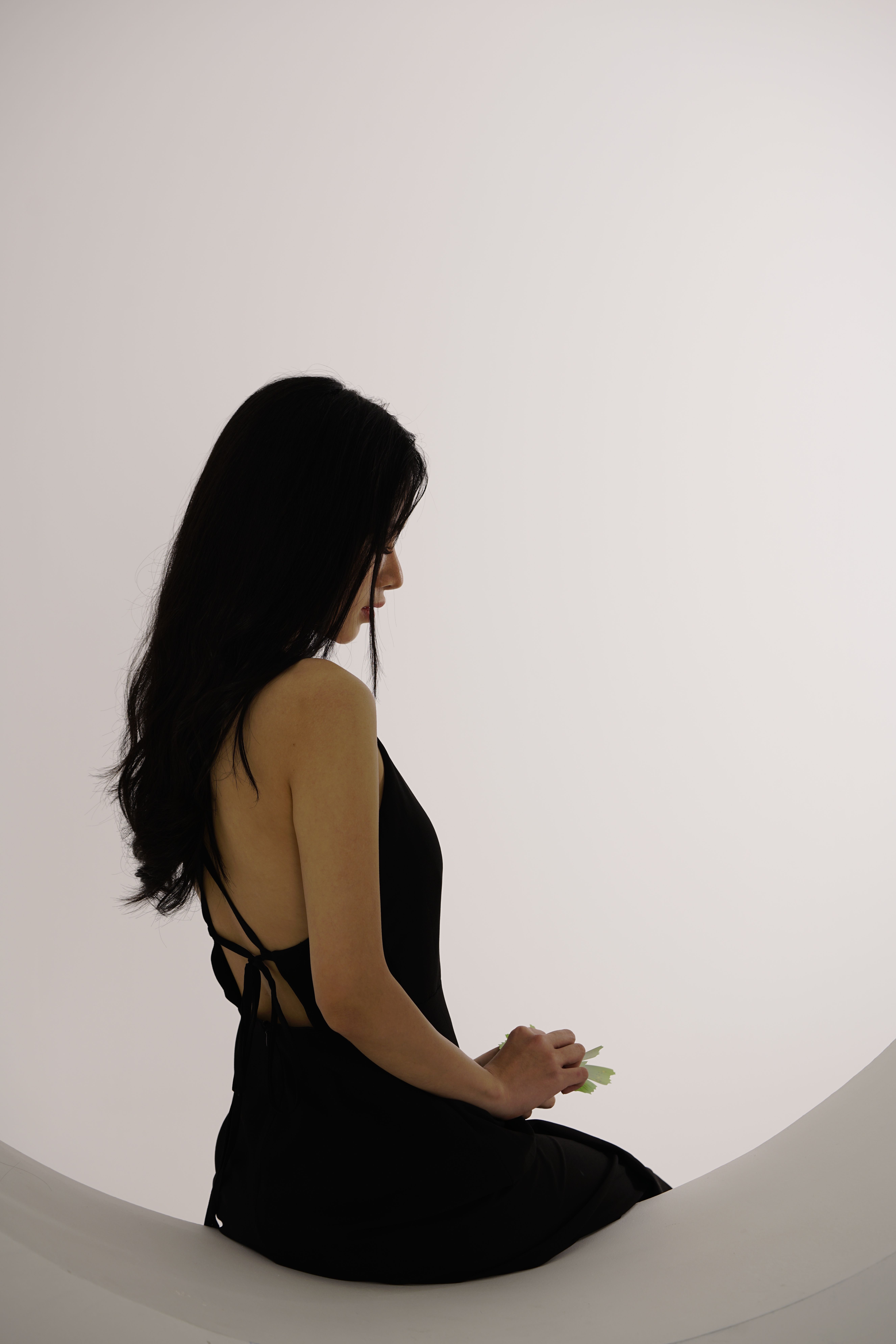 Back View of Woman in Black Dress at Night · Free Stock Photo