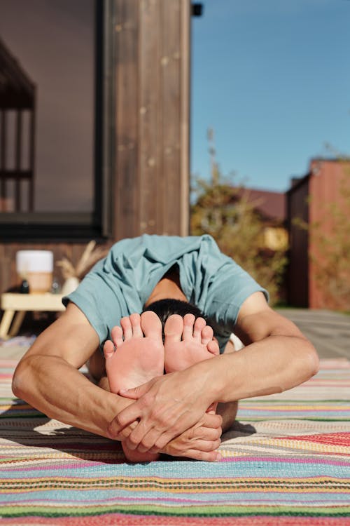Person Seated in Yoga Pose Position