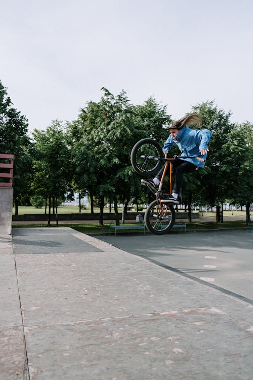 A Man Riding a BMX Bicycle