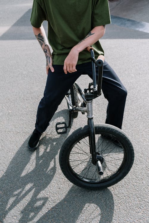 A Man Riding a BMX Bicycle