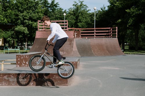 A Man Riding a BMX Bicycle