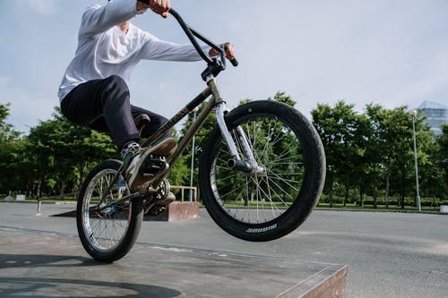 A Person Riding a BMX BIcycle