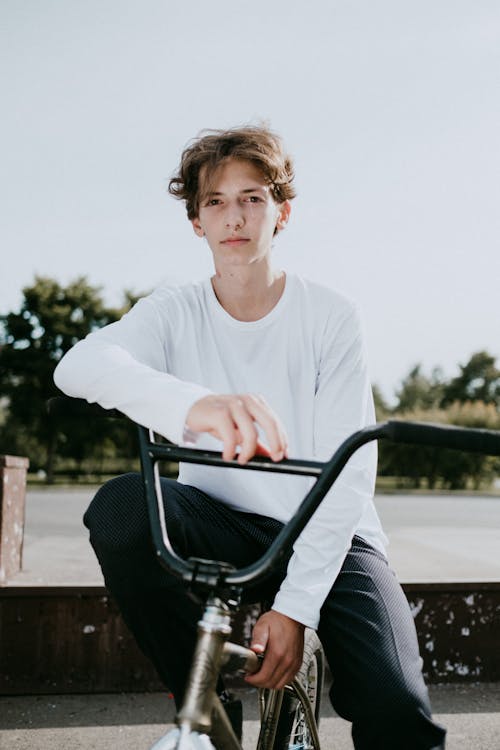 A Man Riding a BMX Bicycle