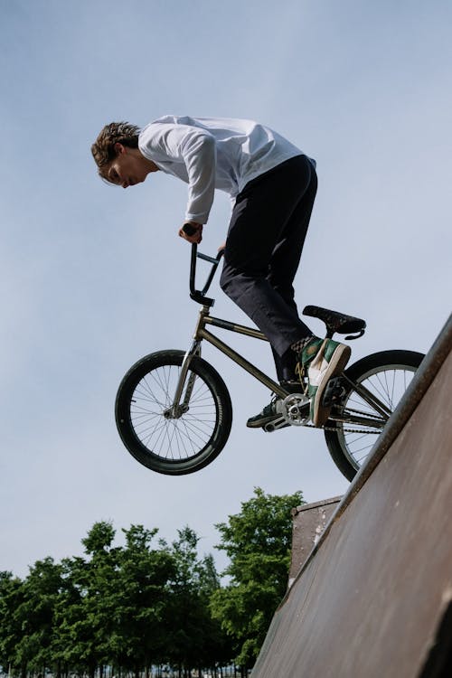 Cyclist Doing Tricks on a Ramp · Free Stock Photo