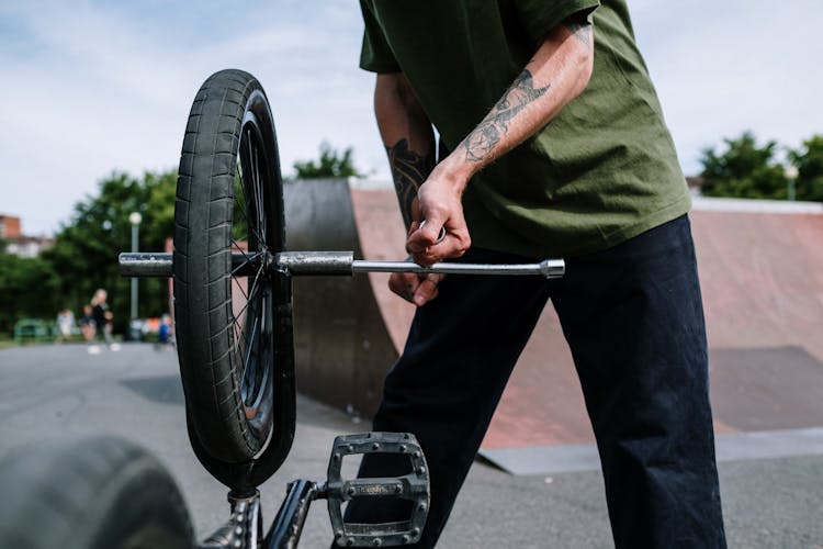 Man Fixing A Tire