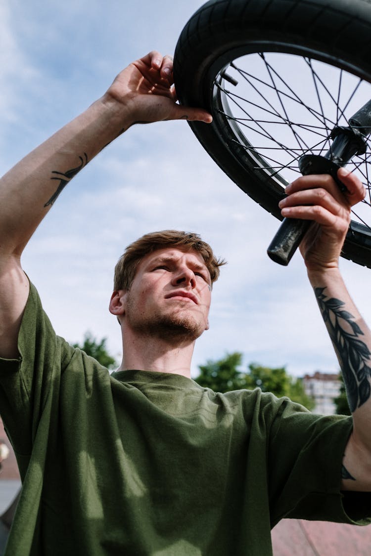 Man Fixing A Tire